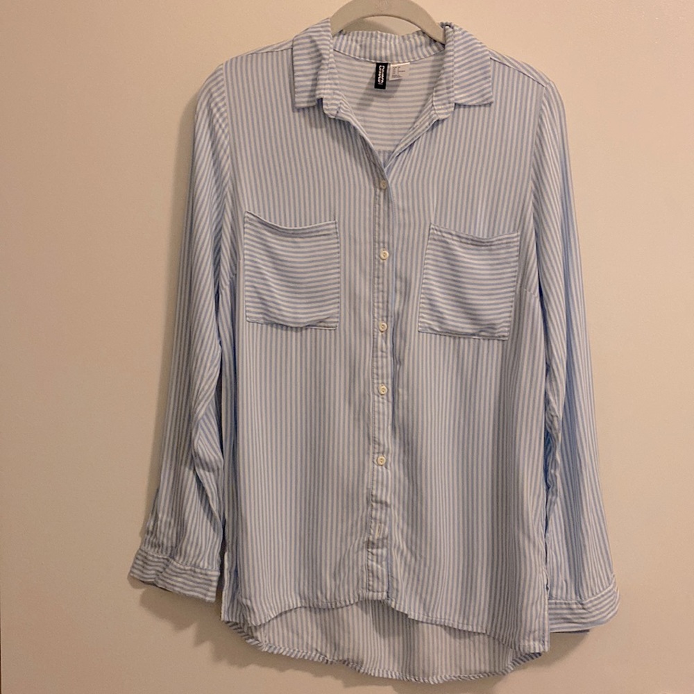 Divided light blue pin striped blouse